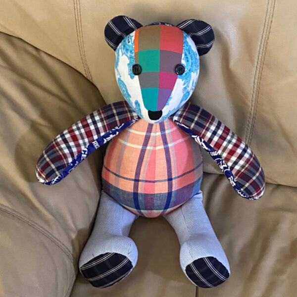 Hand sewn patchwork bear is a wonderful way to rmember a loved one. Patchwork bear is made from multiple garments.